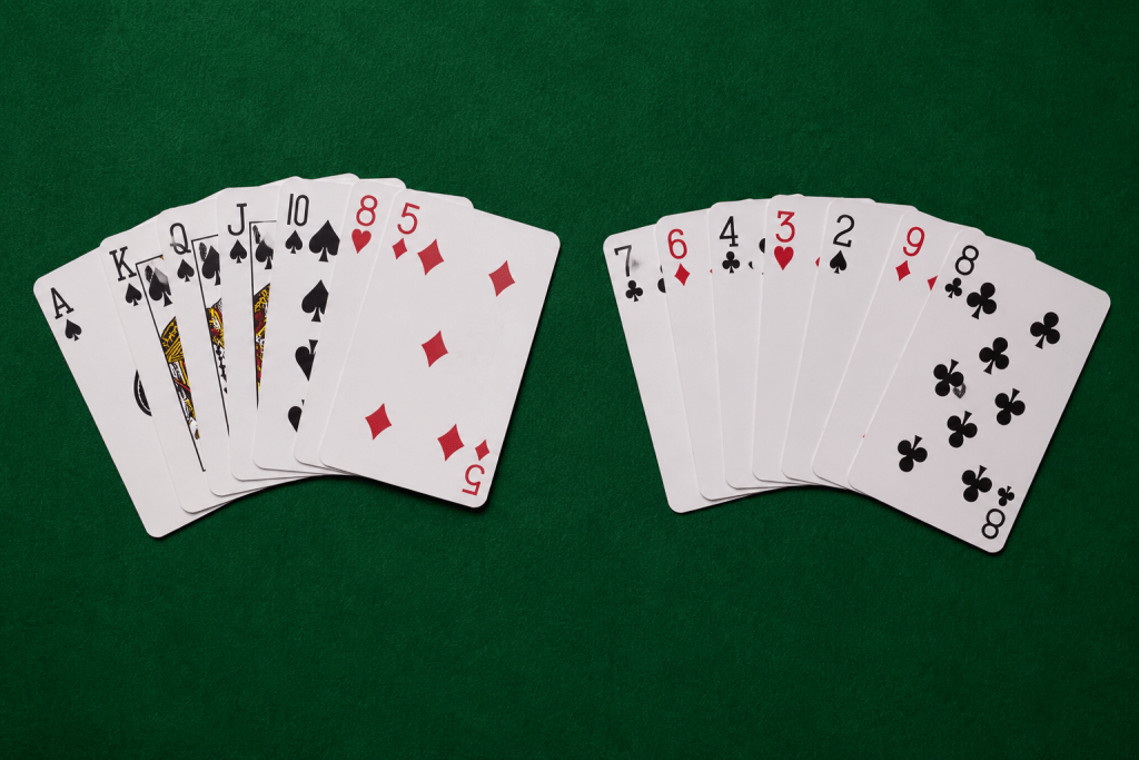 A spade-heavy strong hand beside a weak, low-card hand for comparison
